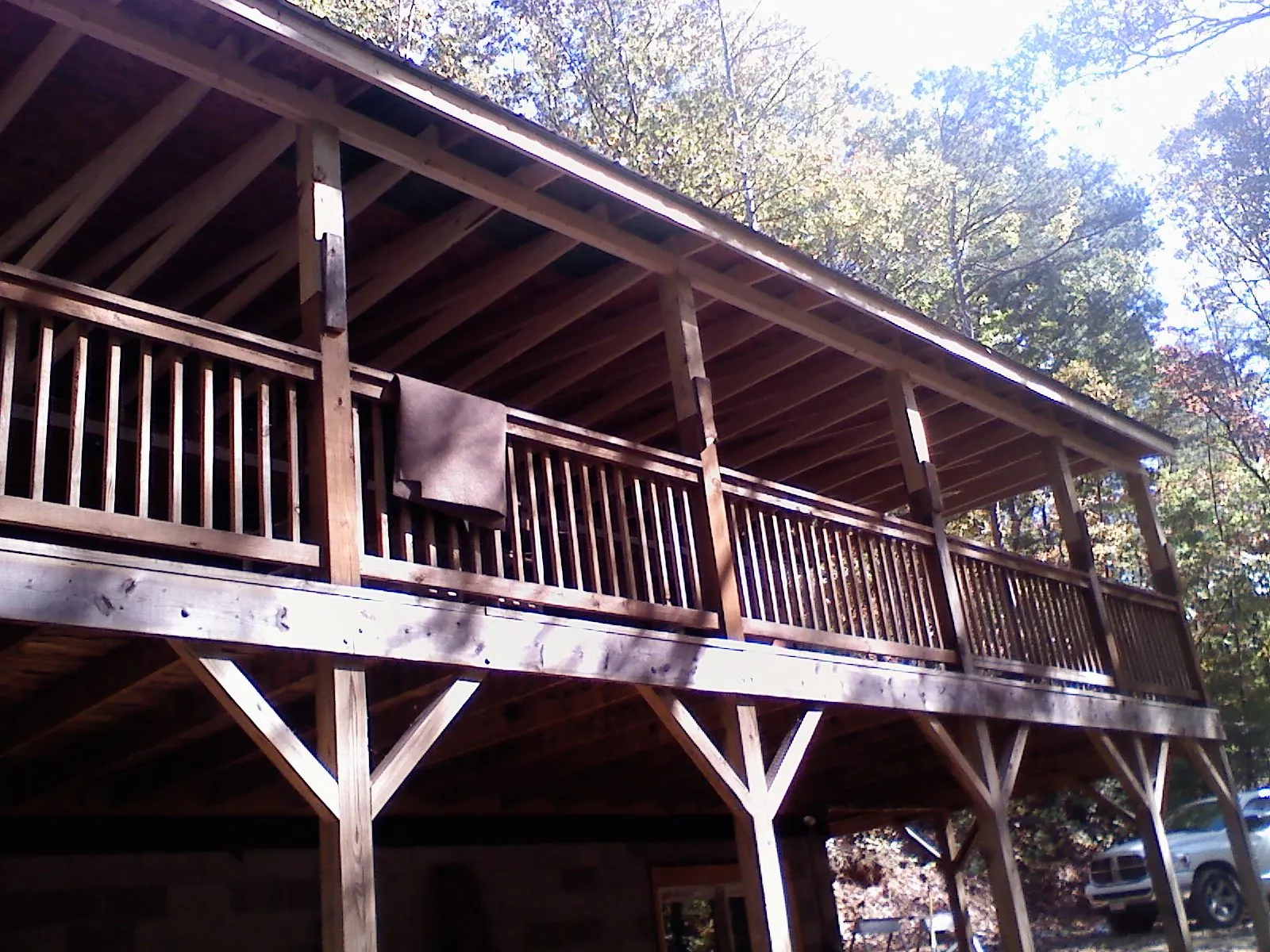 Timber framing under a new elevated porch and deck — Roof Leak Repair in Burlington by Roofing Brothers